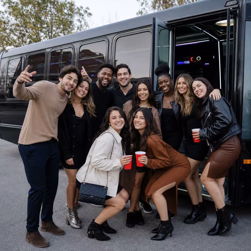 Party bus interior with wraparound leather seating and LED lighting in Princeton