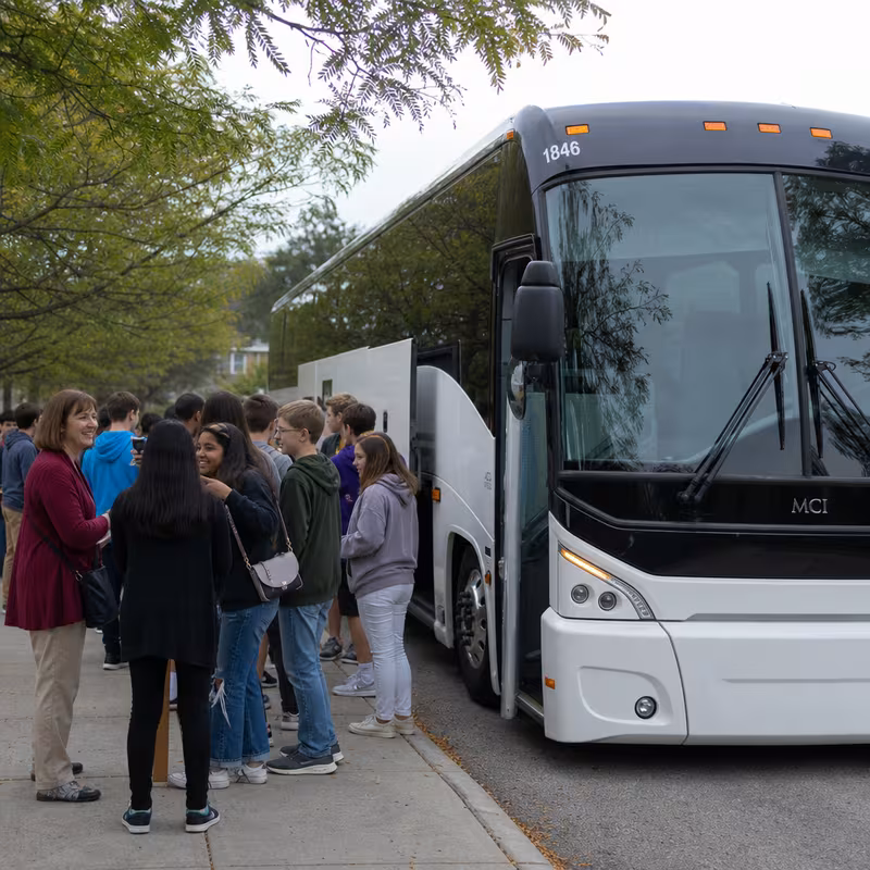 Black Mercedes Sprinter van staged for an Princeton School Transportation group