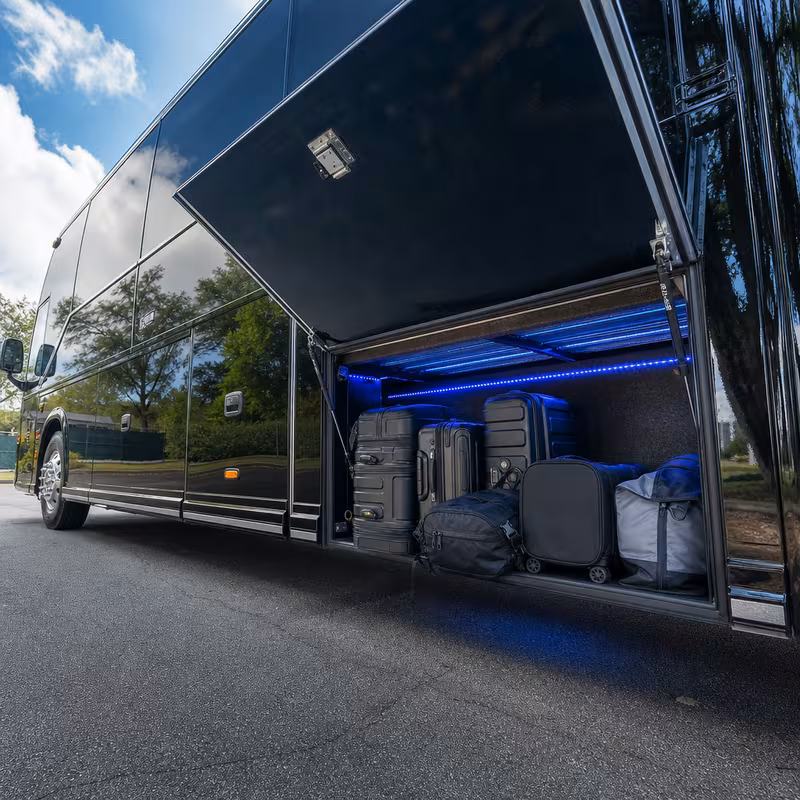 Party bus interior with wraparound leather seating and LED lighting in Princeton