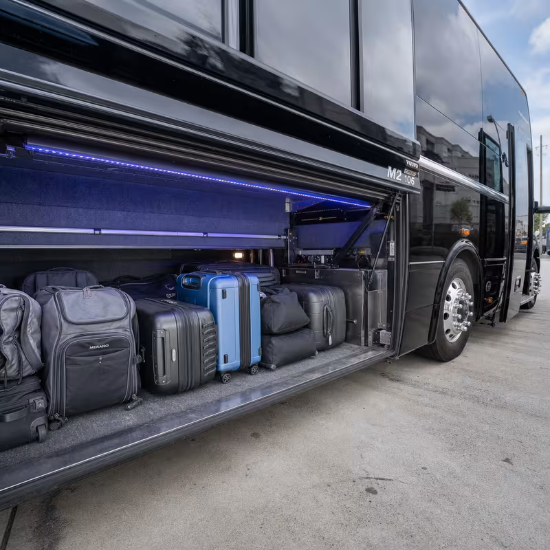Party bus interior with wraparound leather seating and LED lighting in Princeton